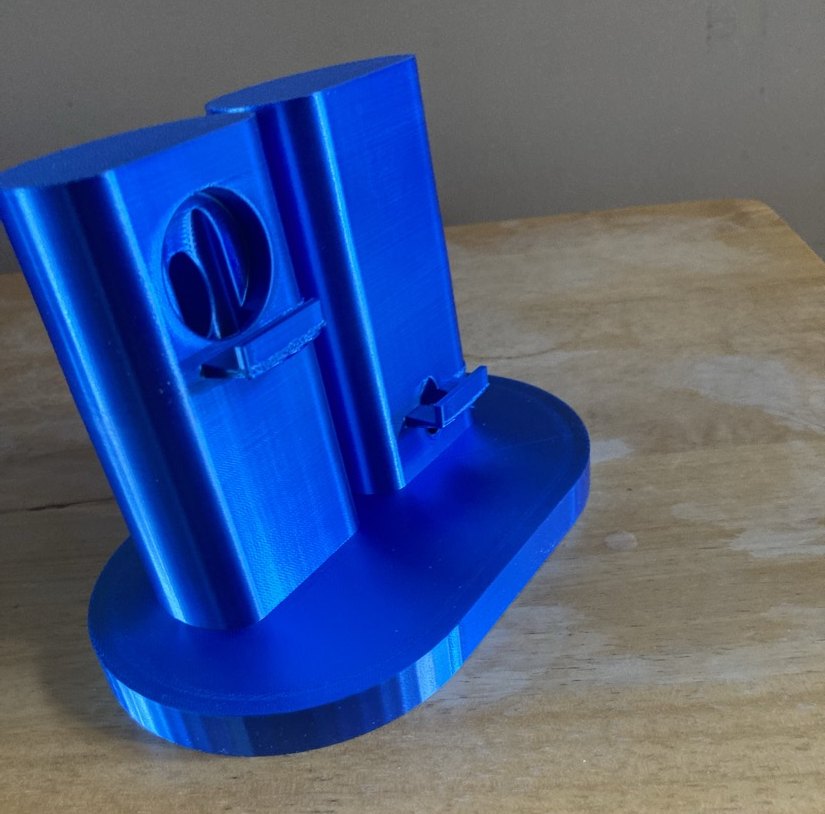 The same blue dual holder seen from the side