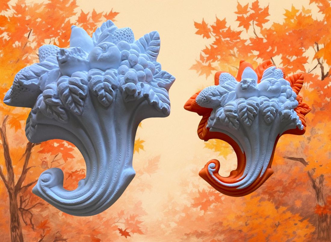 A pair of cornucopia horns in autumn colors